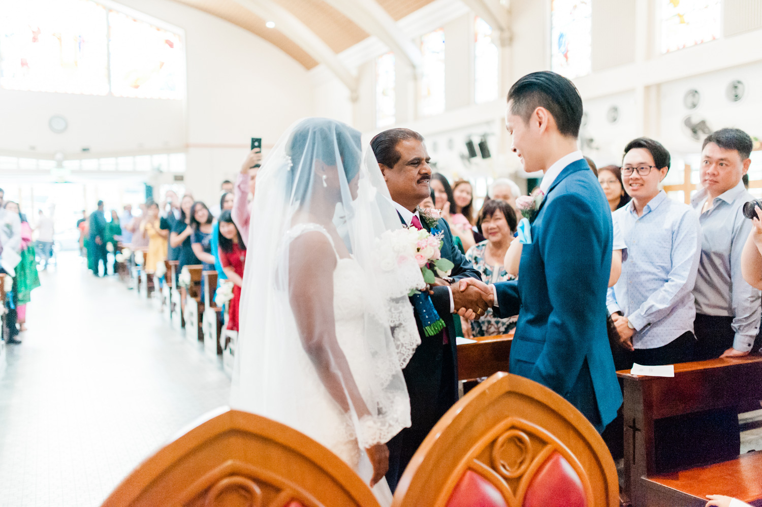 sfx-church-st-francis-xavier-kuala-lumpur-wedding-actual-day-mixed-couple-marriage-candid-blue-themed
